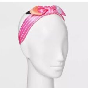 Pink and white striped pencil headband .